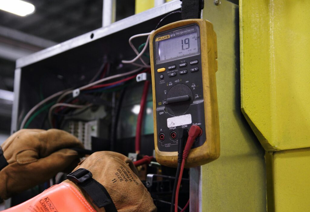 Licensed electrician verifying EV charger Halifax installation.