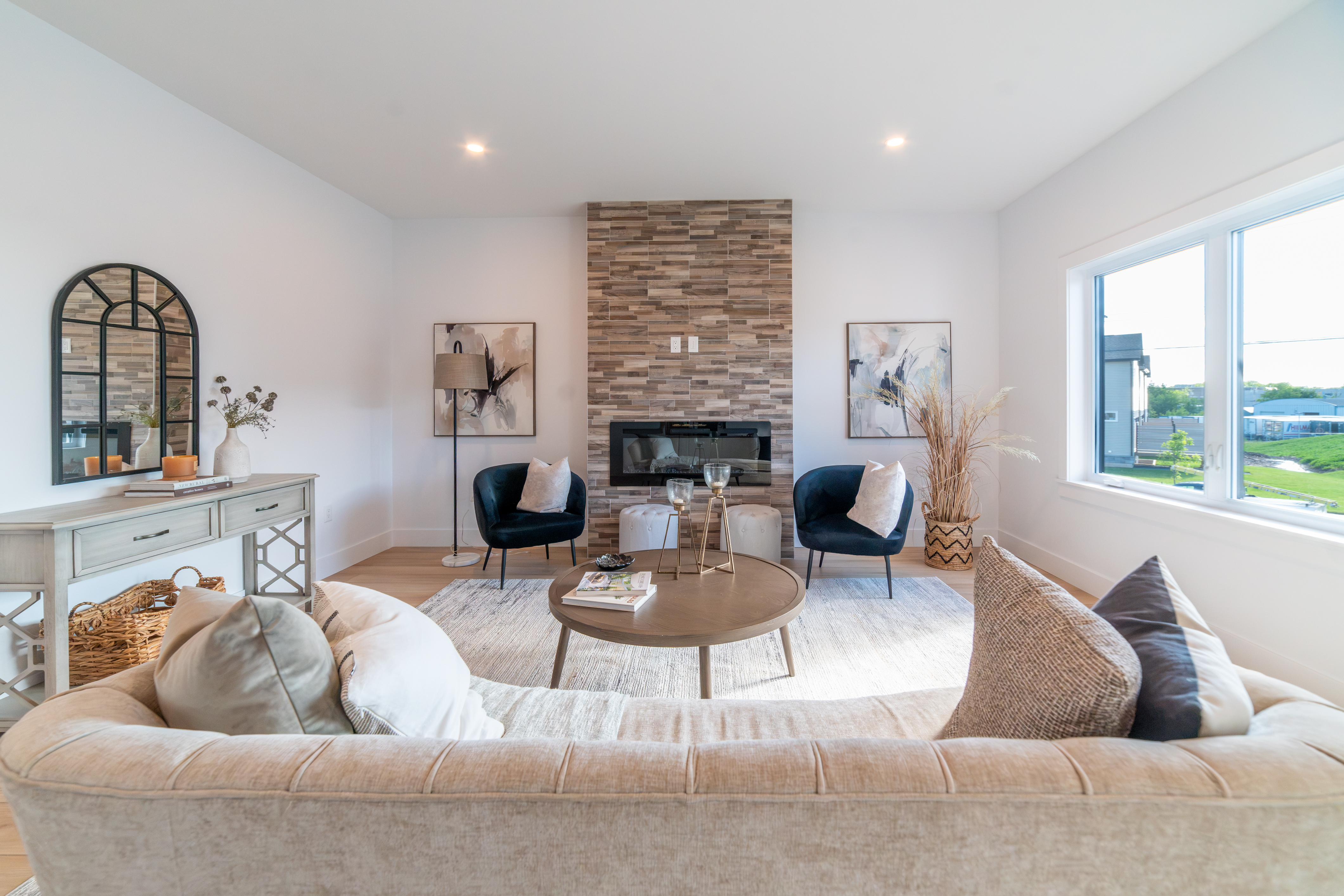 Modern living room with fireplace and recessed lighting